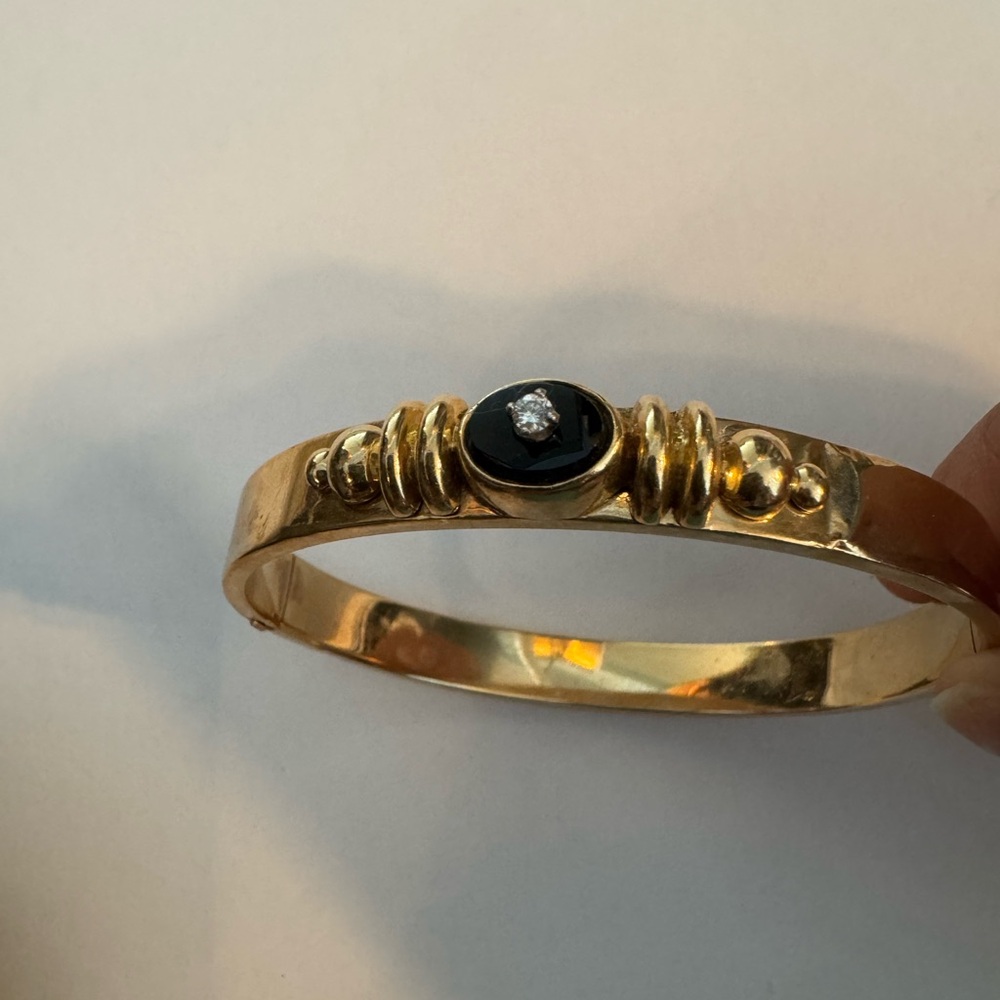 Elegant Gold and Black Women's Bracelet